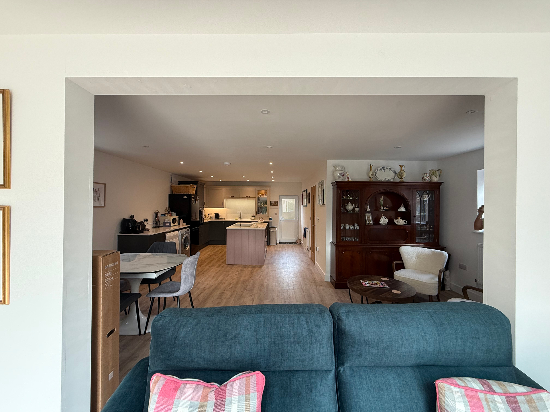 Finished open plan living and kitchen area in a new build home by A Baker Construction West Sussex