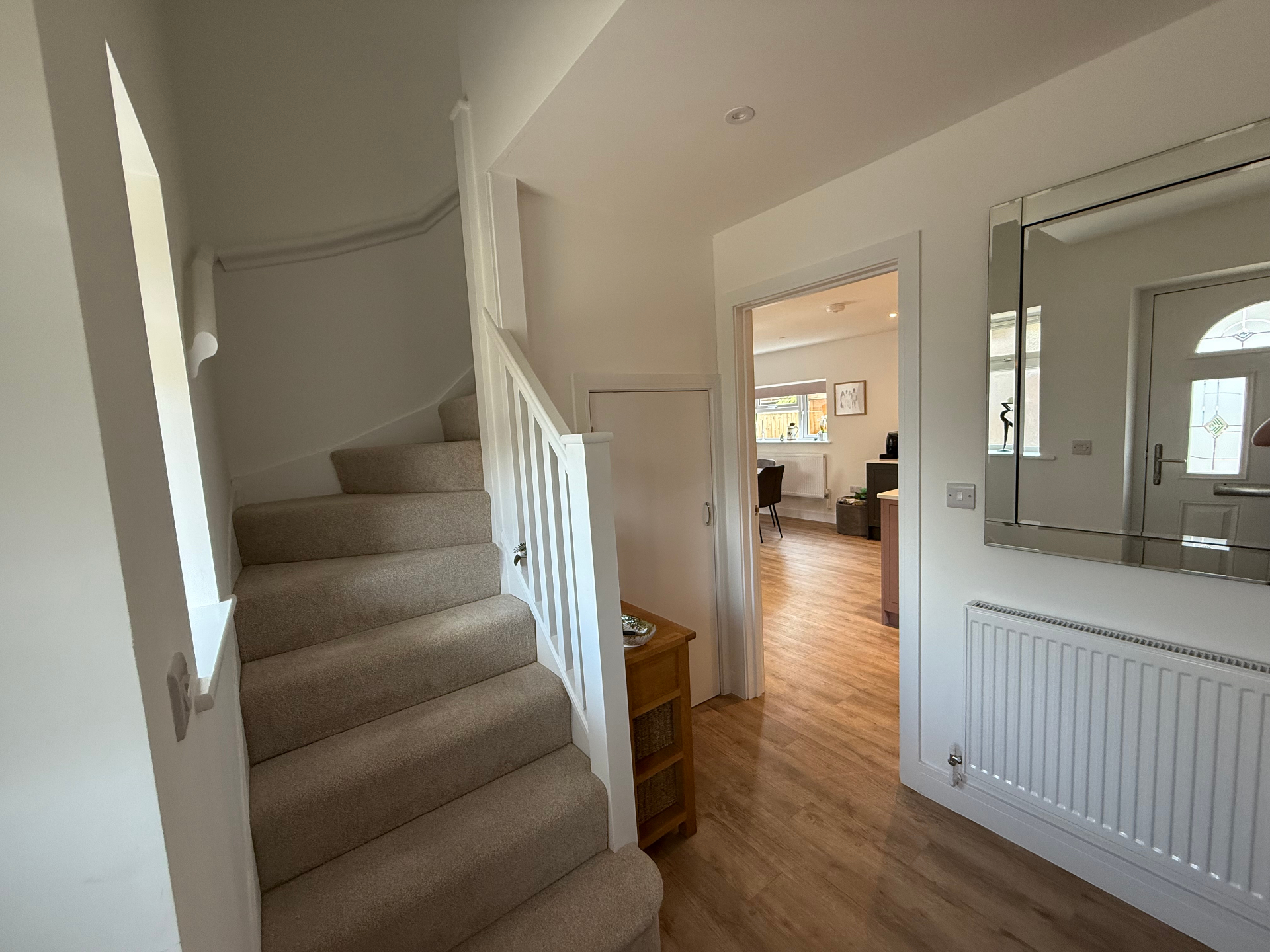 Finished entrance hall and staircase in a new build home by A Baker Construction West Sussex
