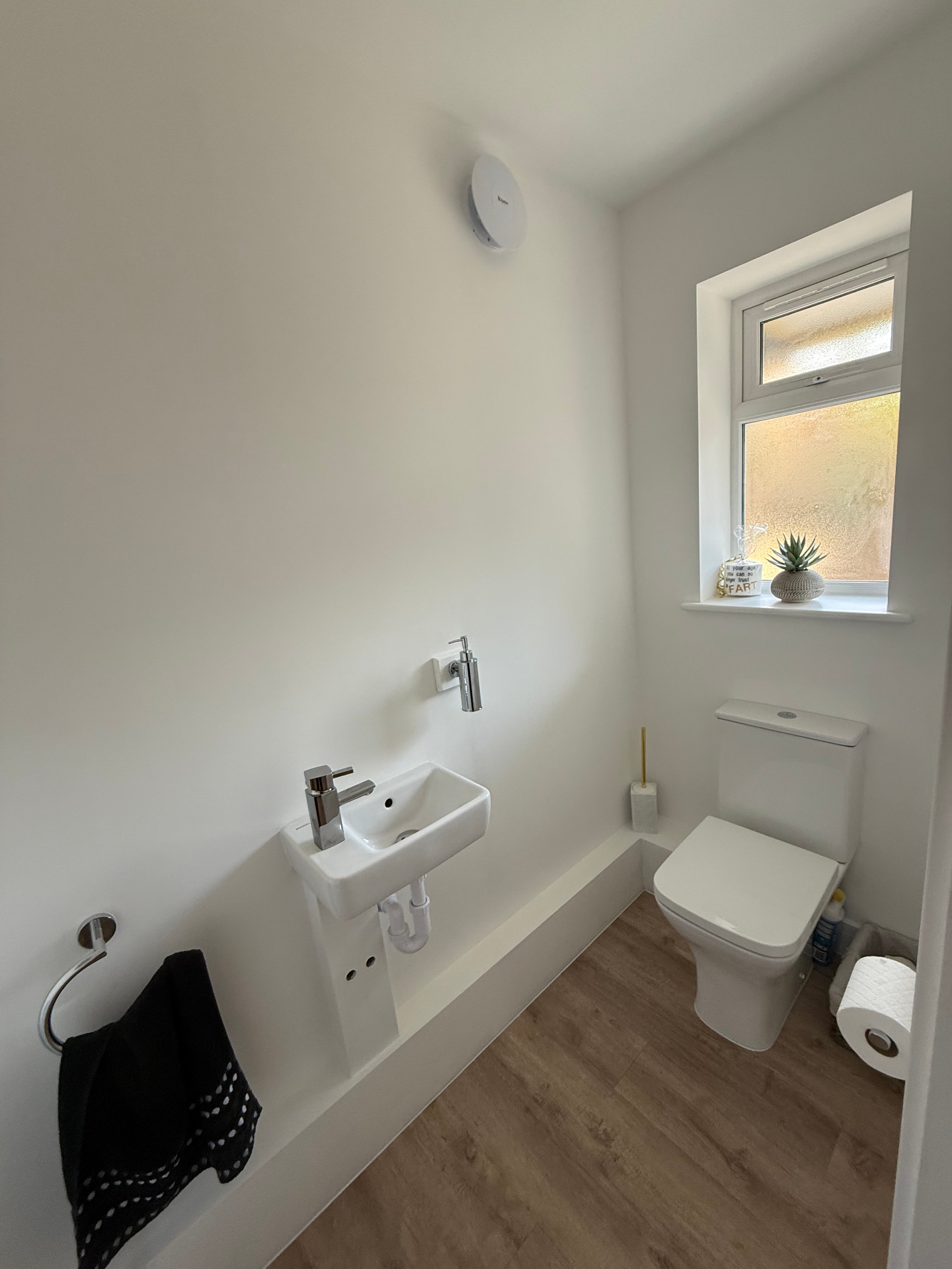 Finished ground floor cloakroom in a new build home completed by A Baker Construction West Sussex