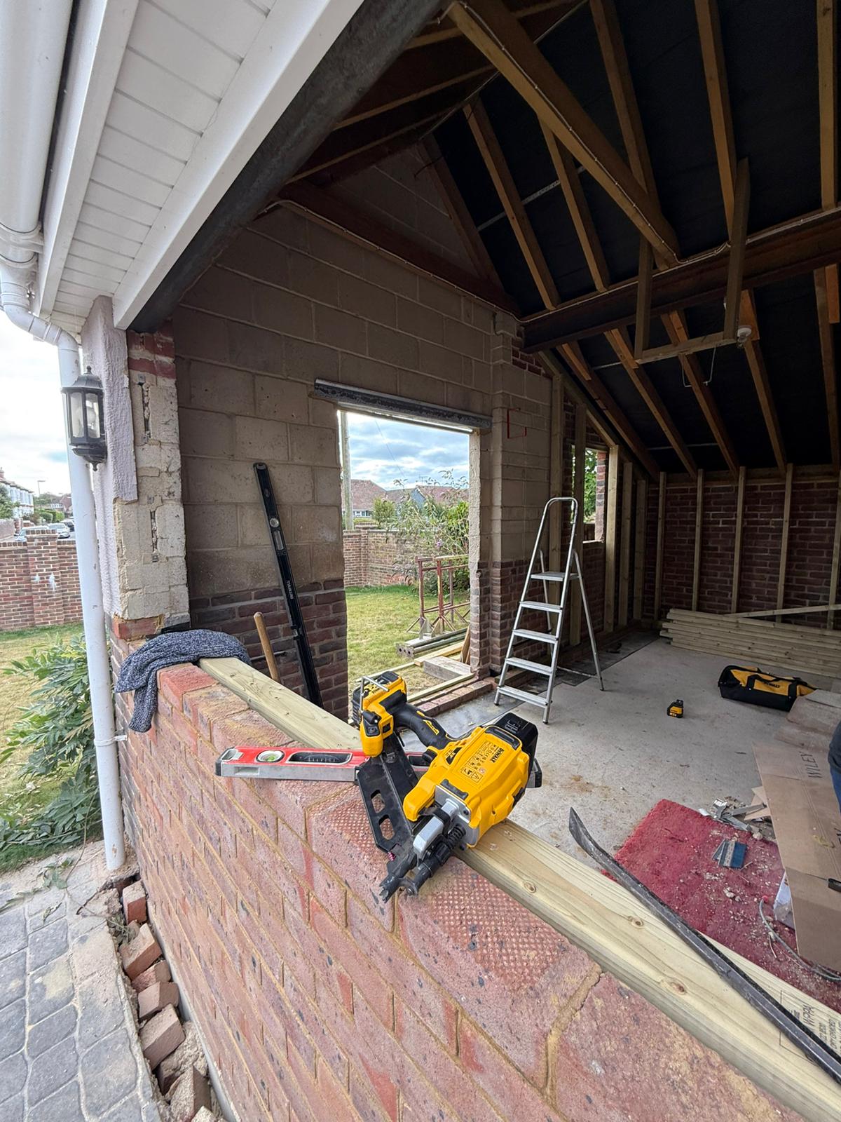 Garage conversion roof trusses and open frame interior West Sussex