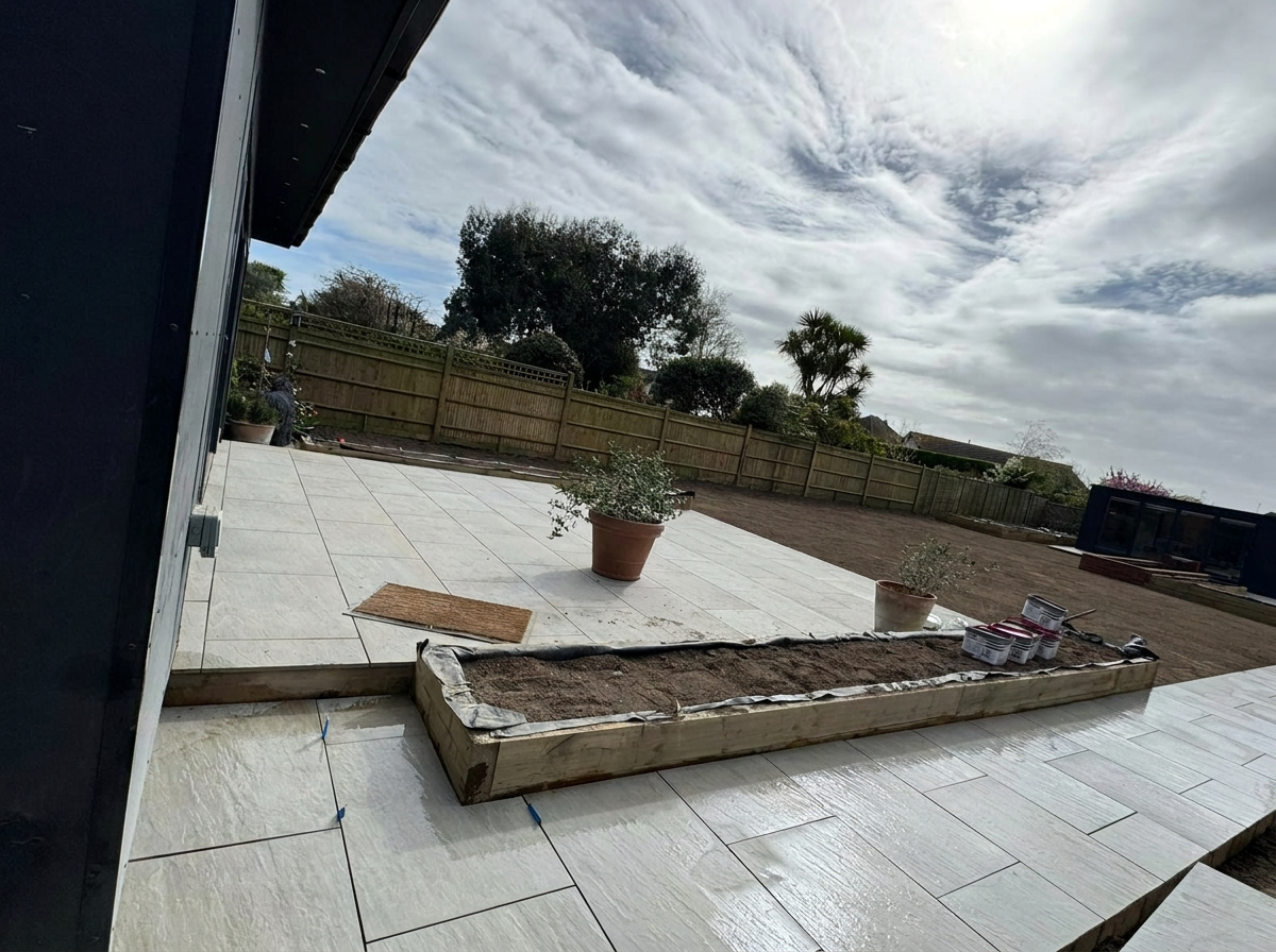 New patio area laid with lawn being prepared West Sussex