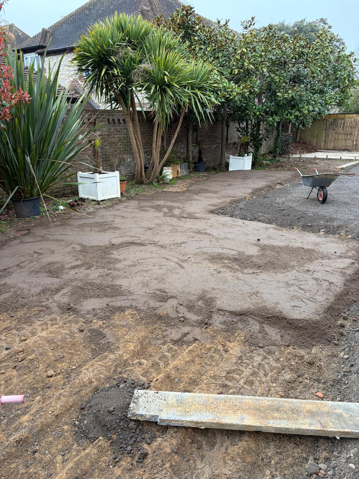 Stepping stone path being laid during garden renovation West Sussex