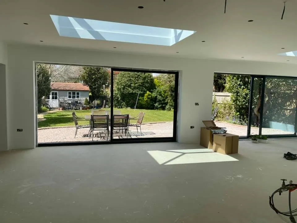 Large open plan extension with skylights and bifold doors by A Baker Construction West Sussex
