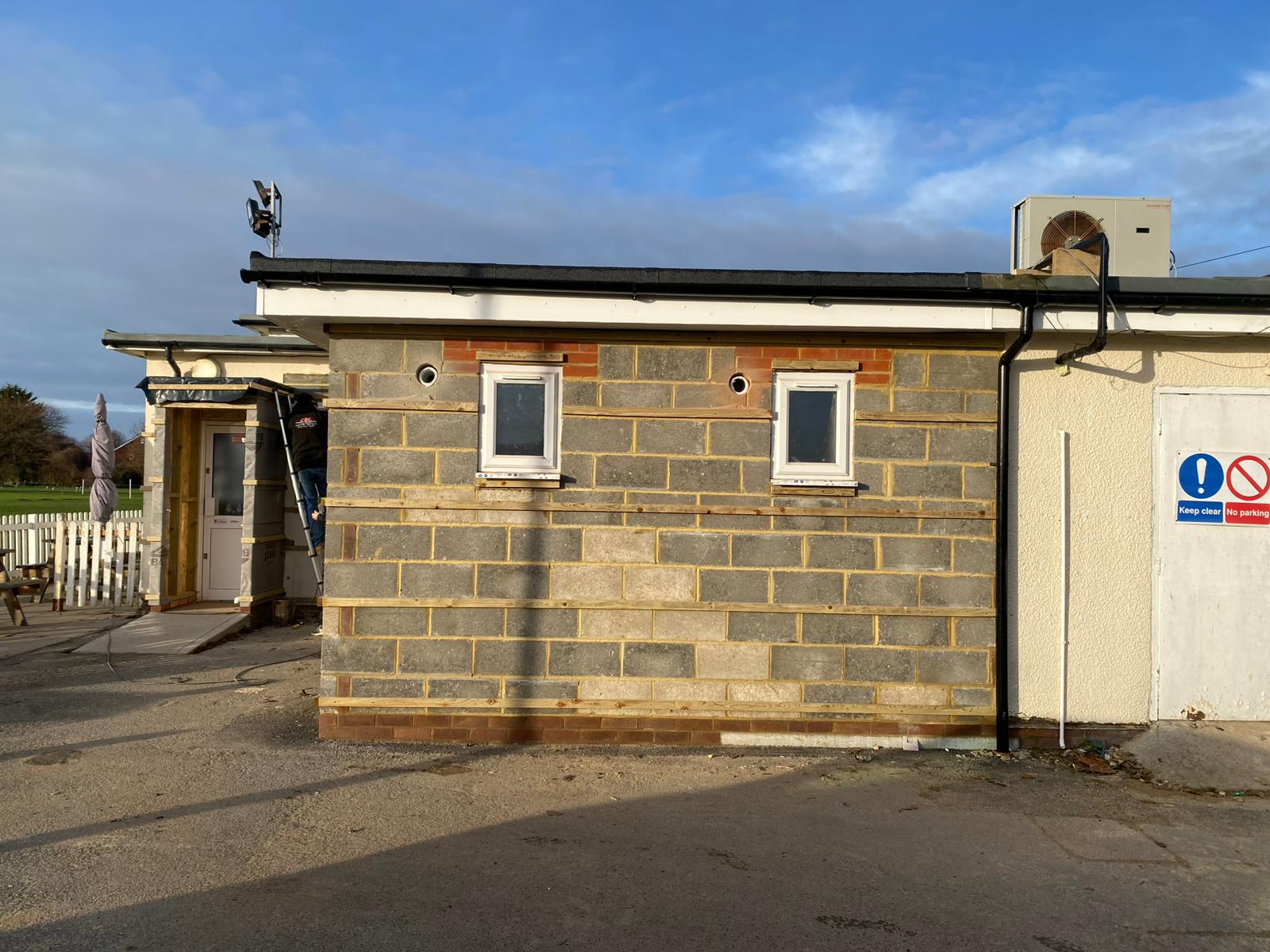 Blockwork walls being built during Rustington Sports Club refurbishment West Sussex
