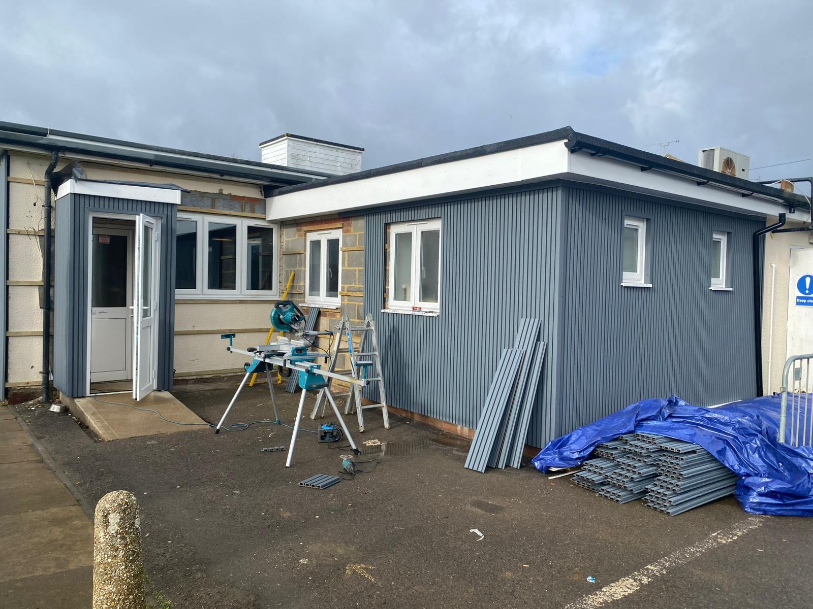 External cladding being fitted to Rustington Sports Club West Sussex